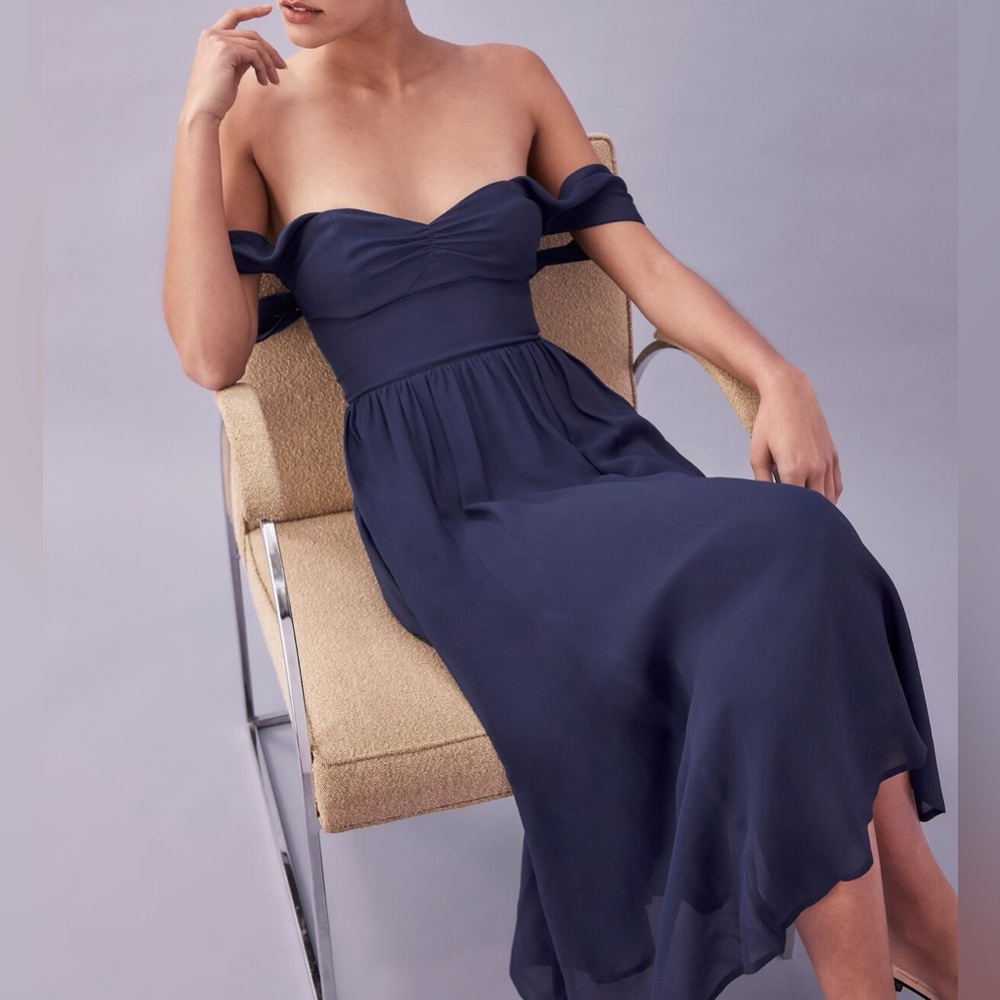 Reformation off-the-shoulder Violet Dress in navy blue.